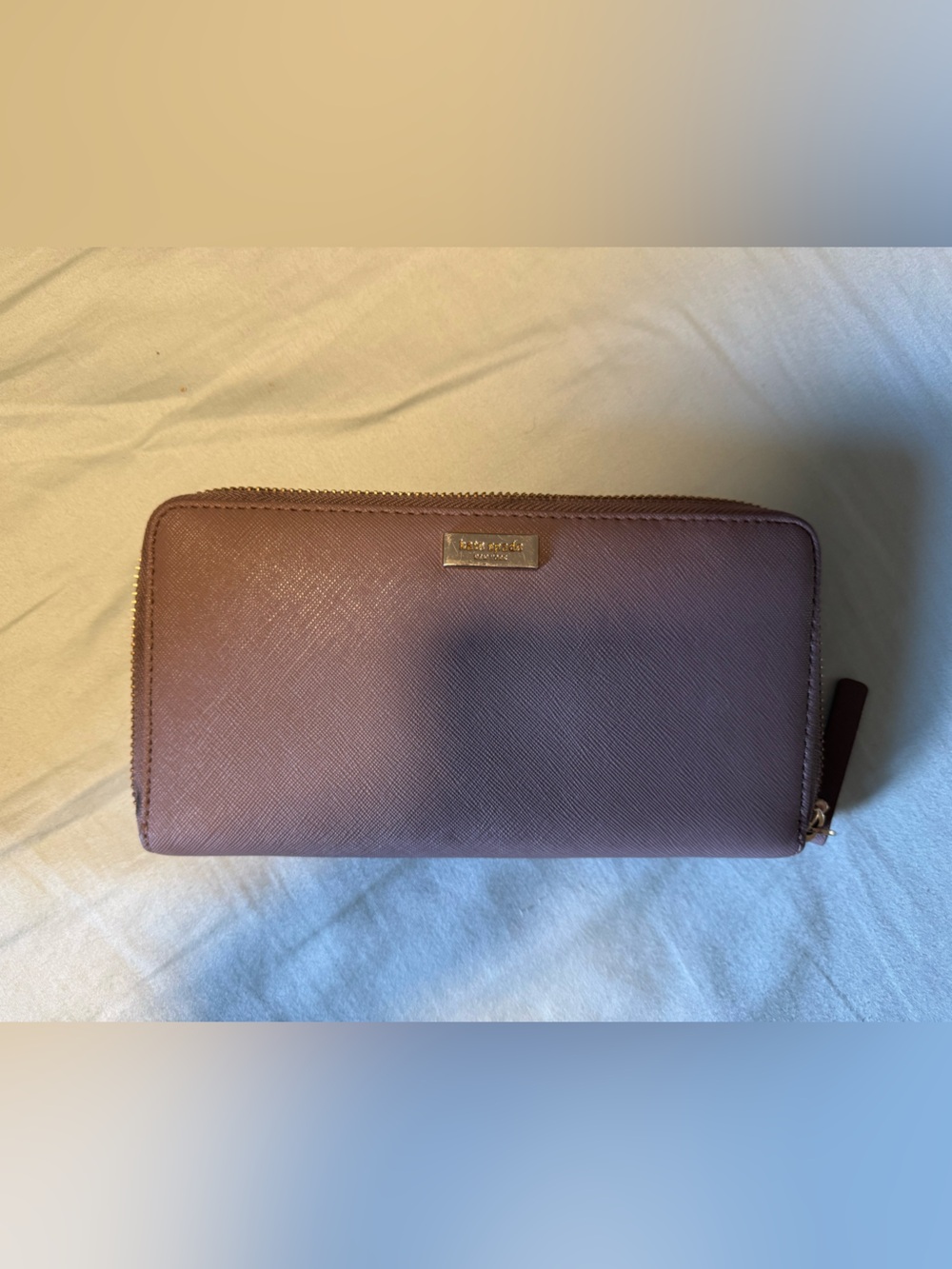 kate spade dusty mauve zip-around Saffiano wallet
